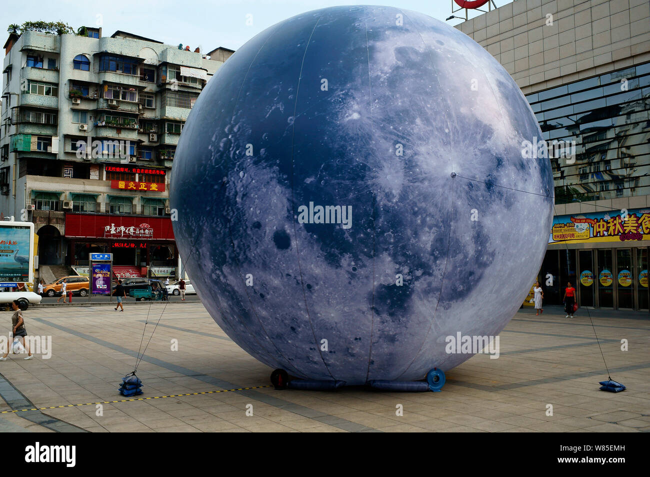 A giant sphere simulating the moon is on display to celebrate the ...