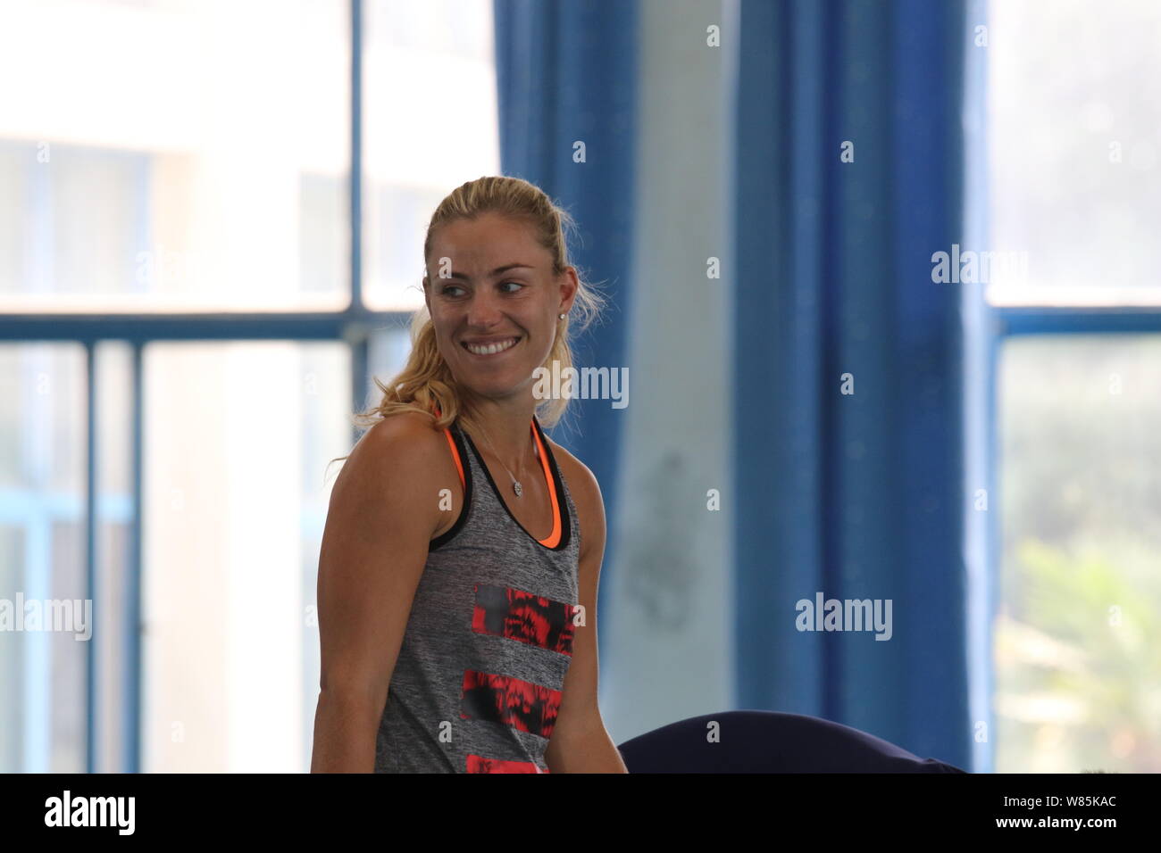 German tennis player Angelique Kerber reacts as she visits Yangtze ...