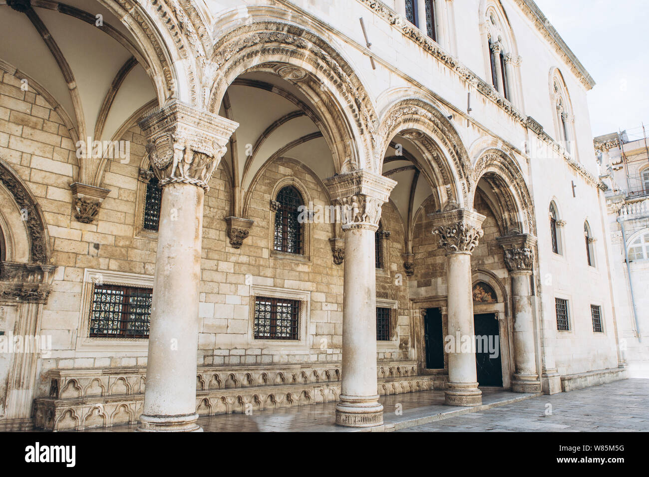 Beautiful view of an old building with columns in Dubrovnik in Croatia. European ancient architecture. Stock Photo