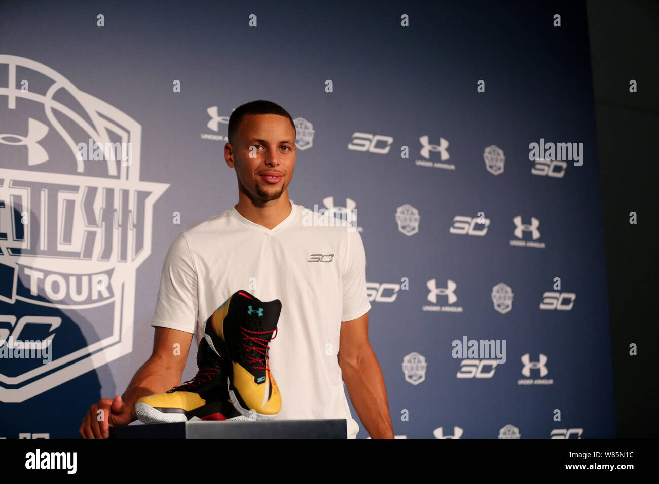NBA star Stephen Curry poses during a press conference for the 