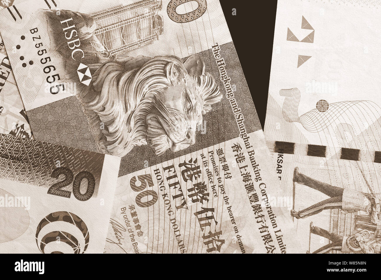 Different Hong Kong dollars bills on a dark background close up. Money ...