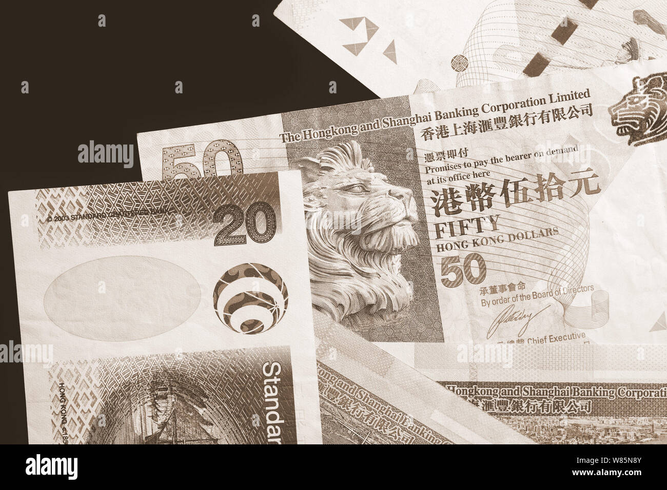 Different Hong Kong dollars bills on a dark background close up. Money ...
