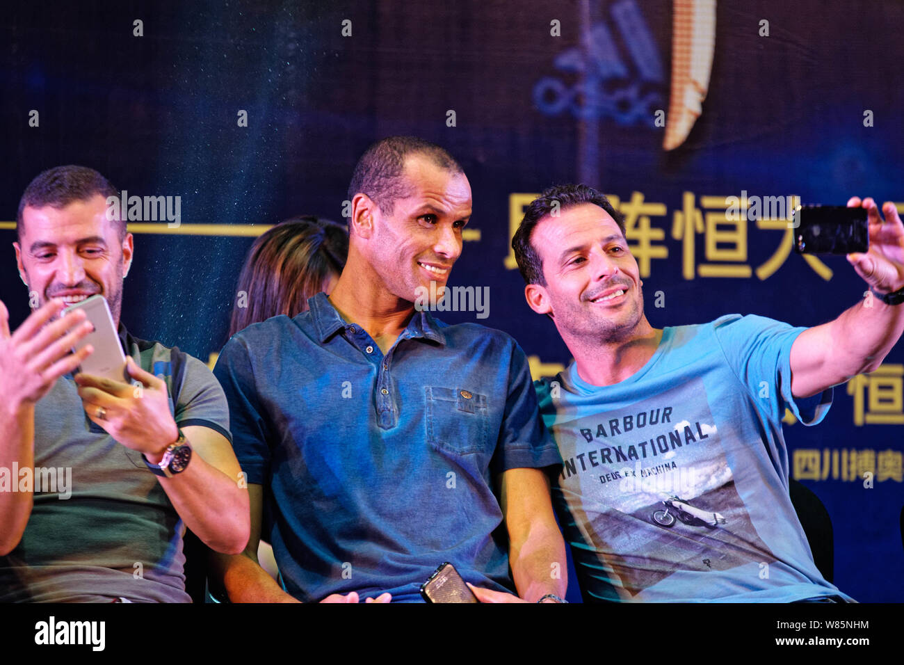 (From left) Portuguese soccer star Simao Sabrosa, Brazilian soccer star Rivaldo and French soccer star Ludovic Giuly attend a fan meeting event in Che Stock Photo