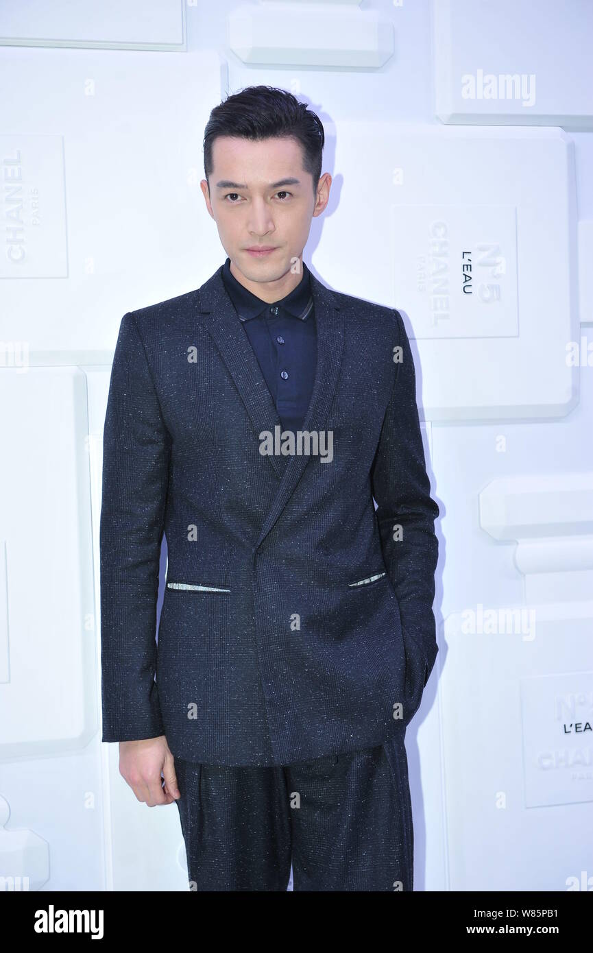 Chinese actor Hu Ge poses as he arrives for a promotional event for Chanel No.5 perfume in Beijing, China, 19 September 2016. Stock Photo