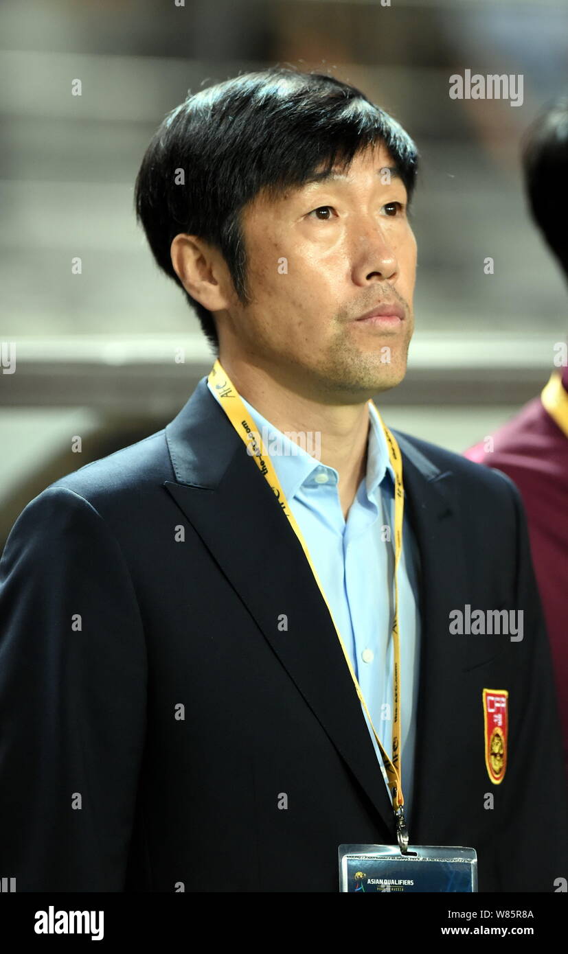Head coach Gao Hongbo of China poses before a Group A soccer match ...