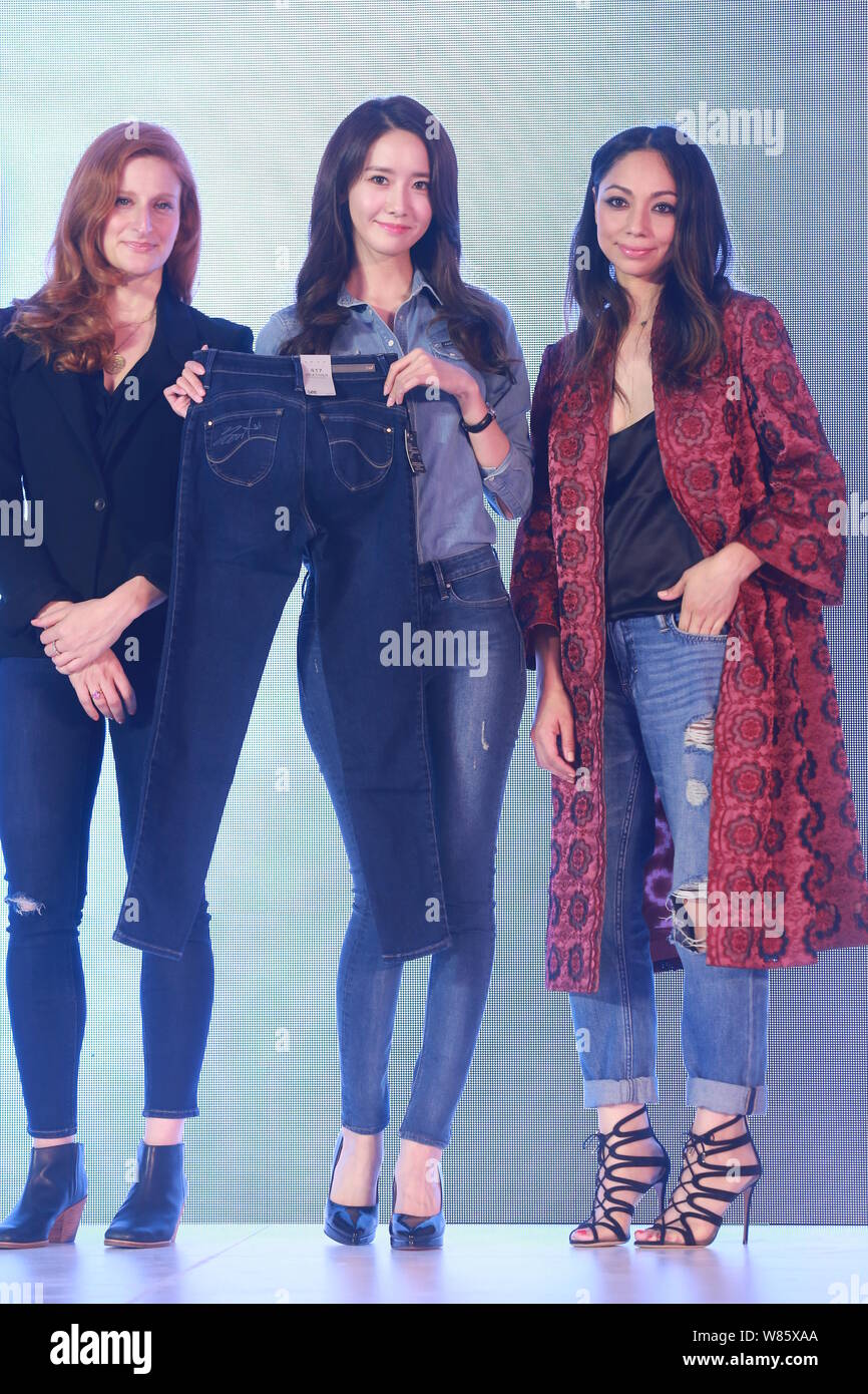 Lim Yoon-a of South Korean idol group Girls' Generation, center, poses during a promotional event for Lee jeans in Beijing, China, 1 August 2016. Stock Photo