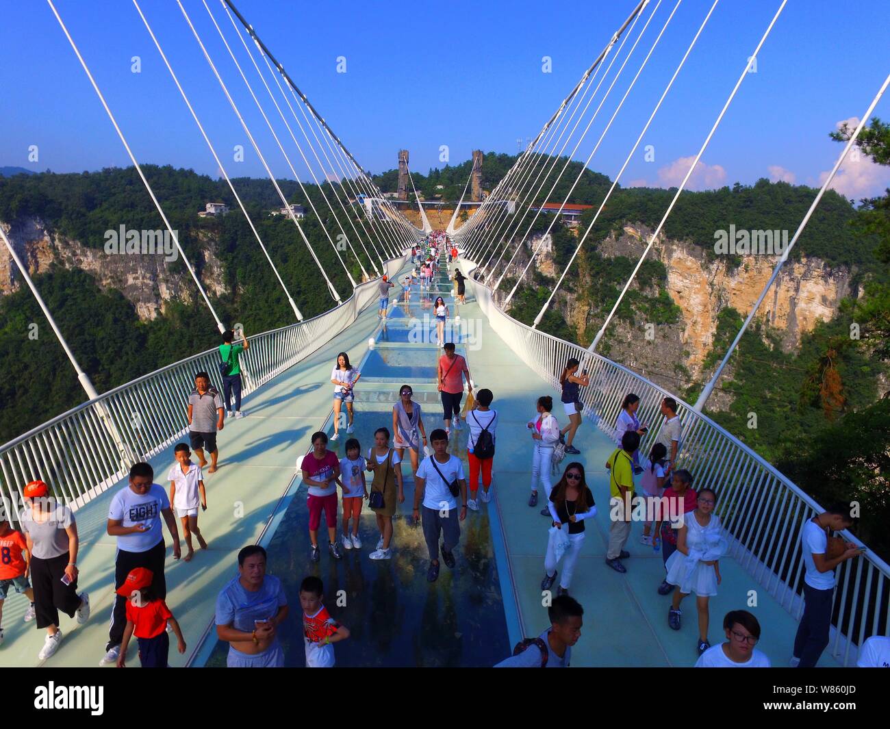 Tourists Crowd The World S Longest And Highest Glass