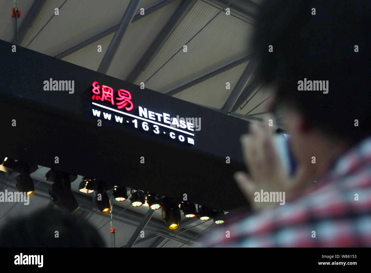 --FILE--People visit the stand of Chinese Internet portal NetEase (163 ...