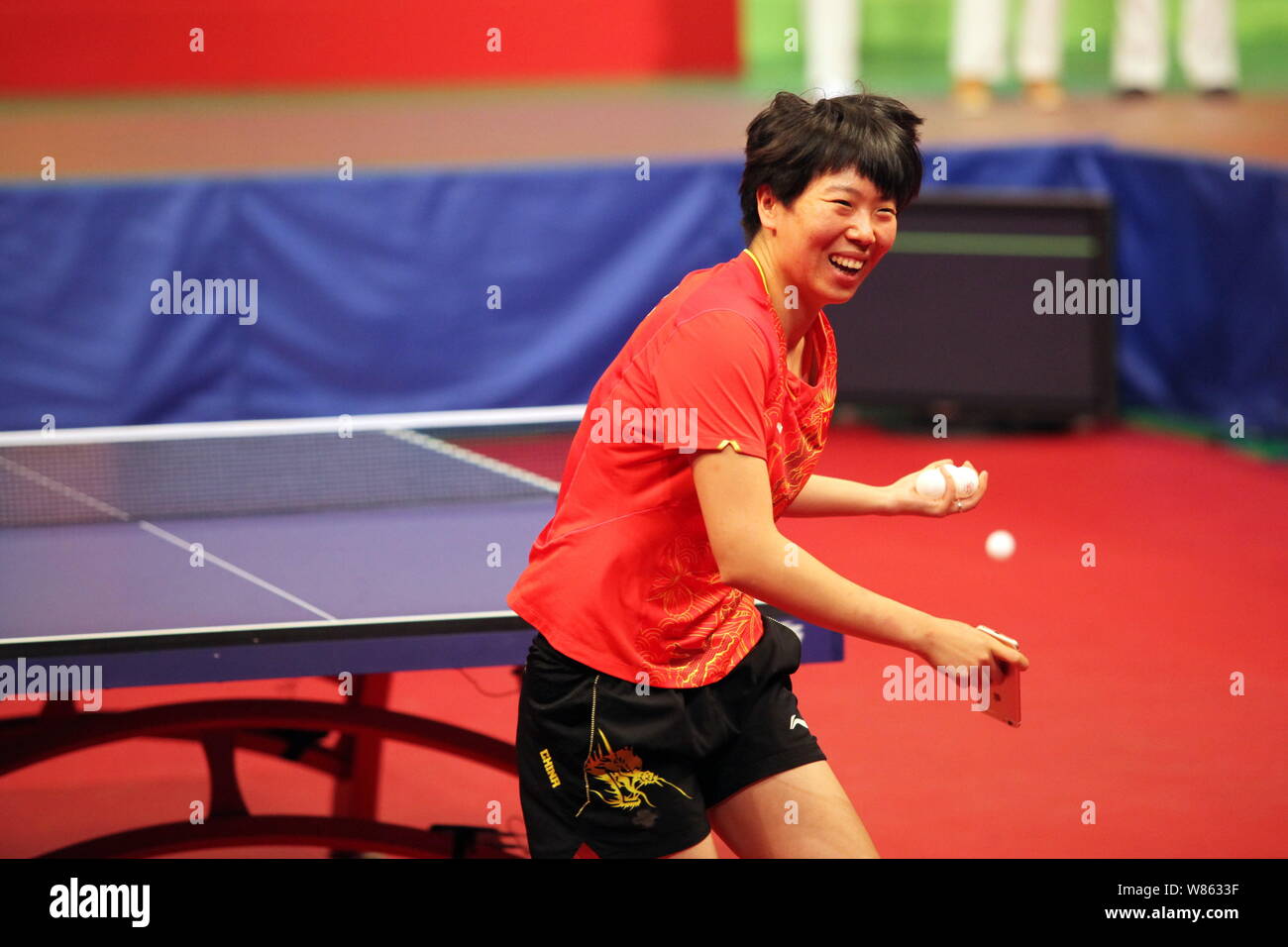 Chinese table tennis player Li Xiaoxia takes part in a table tennis demonstration event during the visit of Rio Olympic gold medalists from Chinese ma Stock Photo