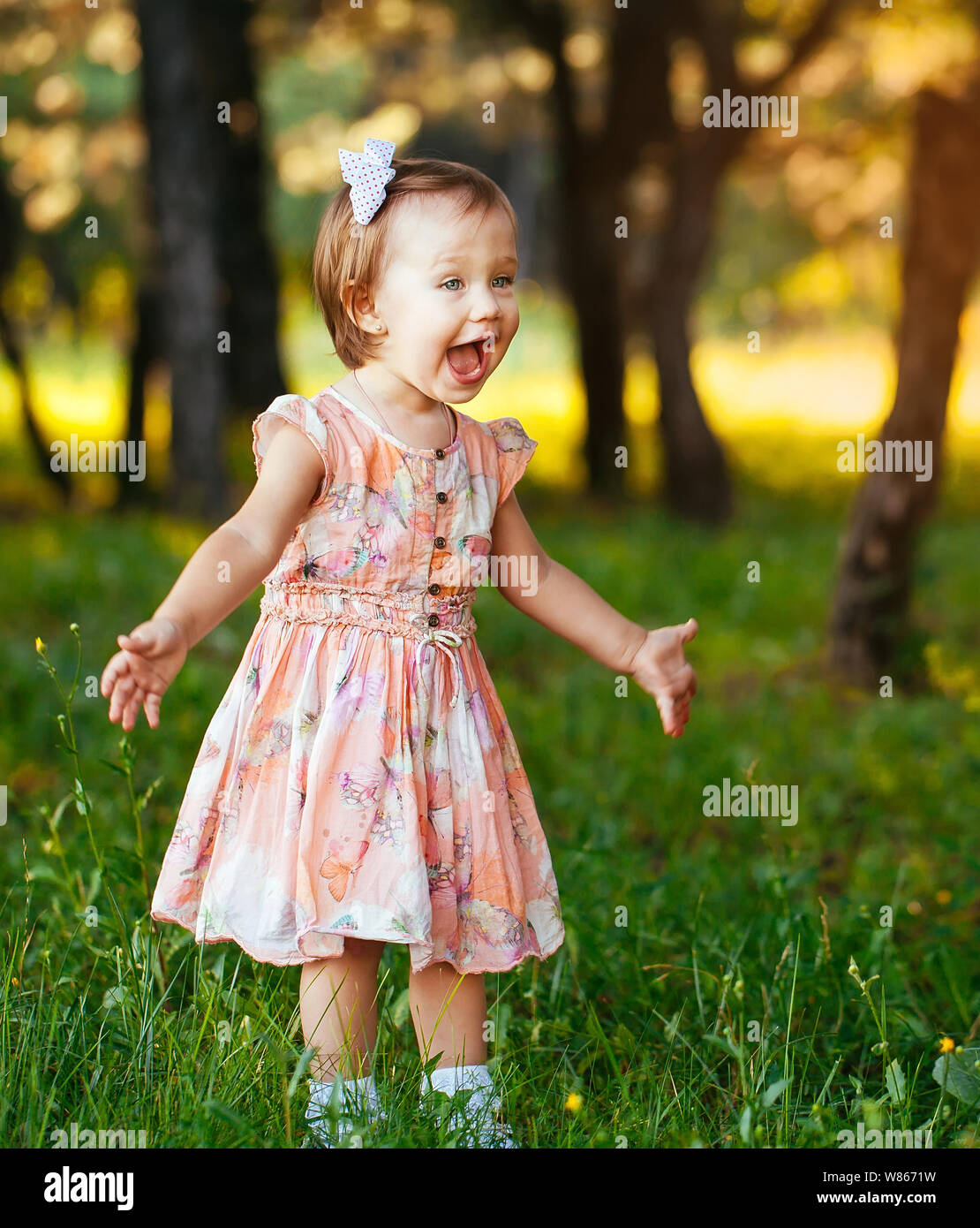 Outdoor portrait of adorable smiling little girl in summer day Stock ...