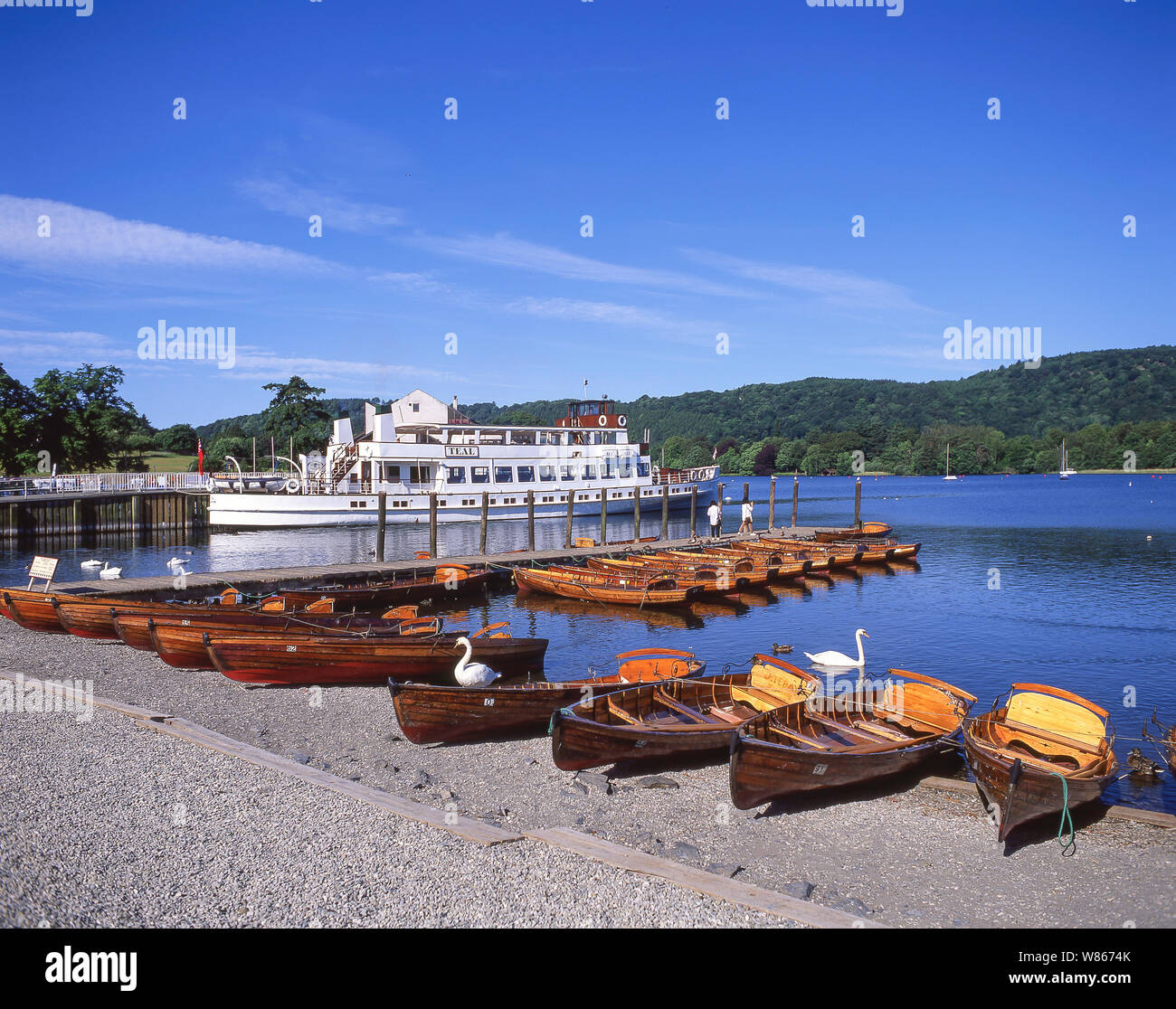 Cruise boat and rowing boats on Lake Windermere, Bowness-on-Windermere, Cumbria, England, United Kingdom Stock Photo