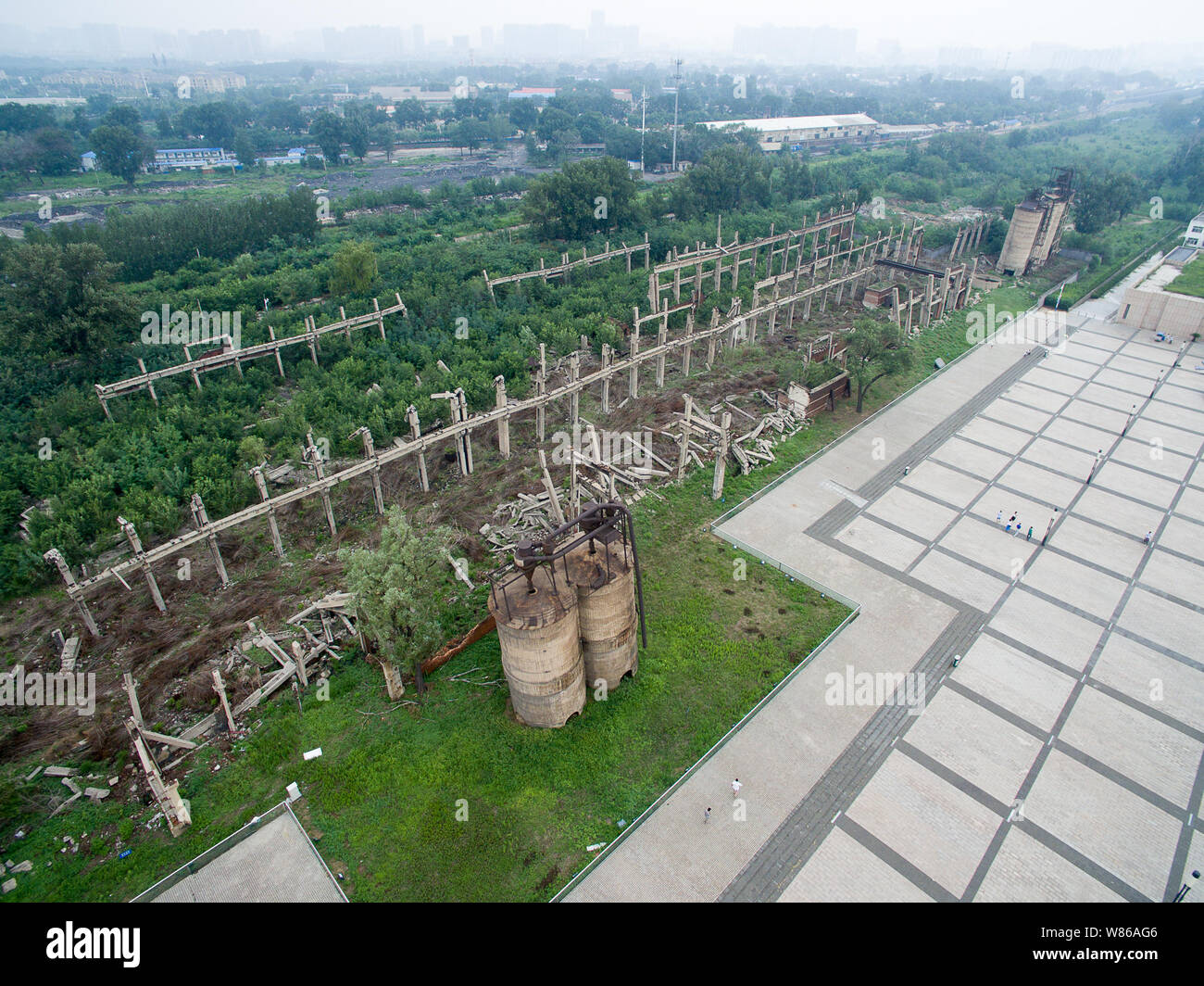 Aerial view of the ruins of a factory destroyed in the 1976 Great Tangshan Earthquake in Tangshan city, north China's Hebei province, 21 July 2016. Stock Photo