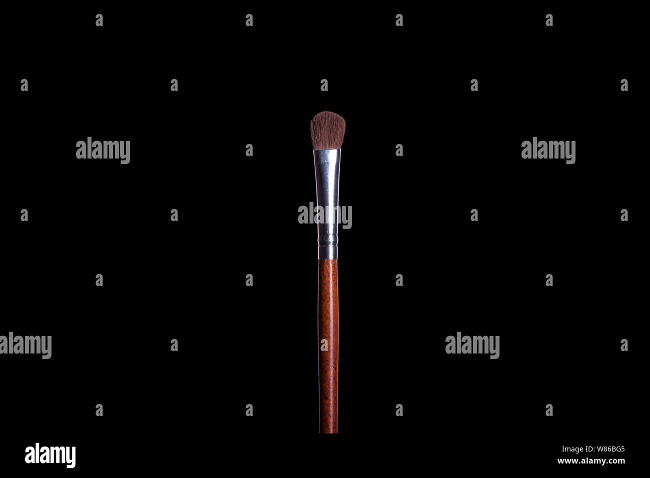Makeup brush, professional face beauty tool, isolate on black background Stock Photo