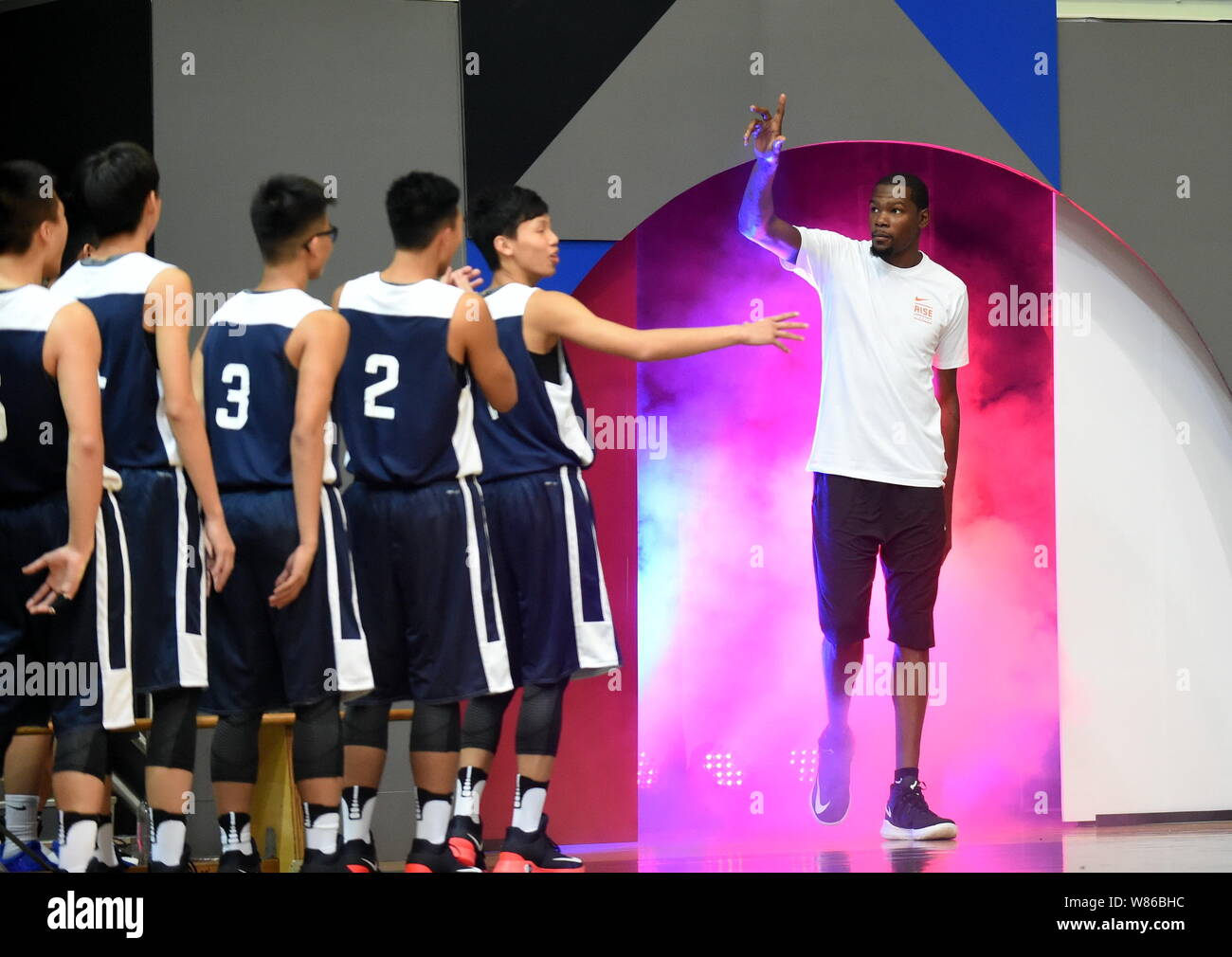 NBA star Kevin Durant, right, interacts with young Chinese players at a  promotional event for Nike Rise Academy during his Asia tour in Hong Kong,  Chi Stock Photo - Alamy