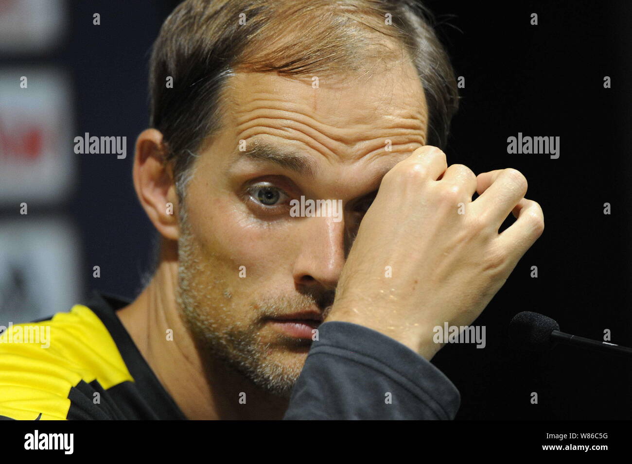 head-coach-thomas-tuchel-of-borussia-dortmund-reacts-at-a-press