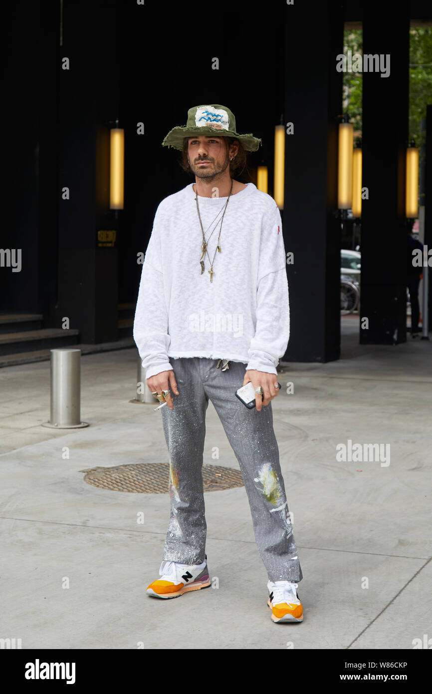 MILAN, ITALY - JUNE 15, 2019: Giotto Calendoli with New Balance shoes  before Neil Barrett fashion show, Milan Fashion Week street style Stock  Photo - Alamy