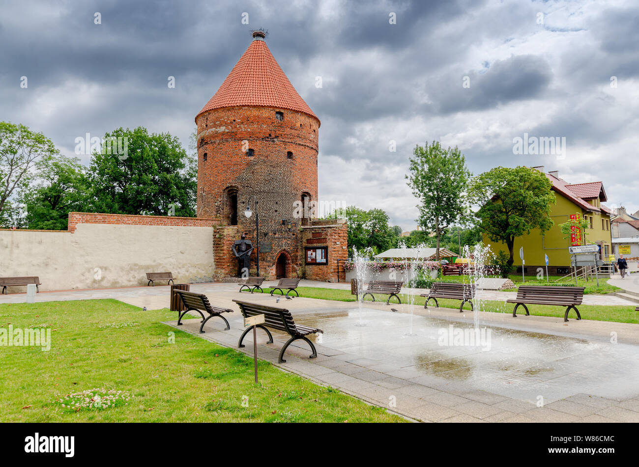 Dobre Miasto, ger. Guttstadt, warmian-mazurian province, Poland. The gothic Stork Tower, remains of the medieval city walls. Stock Photo