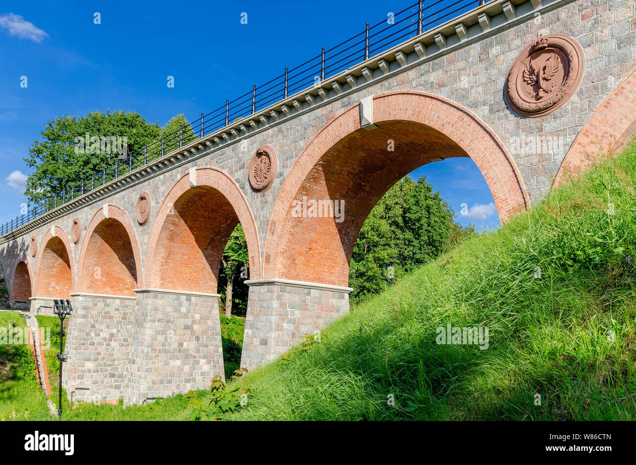 Bytow, pomeranian province, Poland, ger.: Butow. Historic 19th cent. railway bridge over the river of  Boruja. Stock Photo