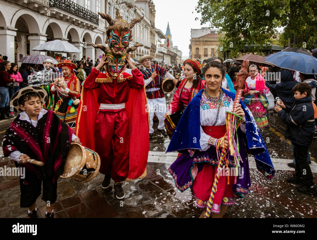 Cuenca, Ecuador, Feb 8, 2018: Man wears devil costume in parade in Ecuador Stock Photo