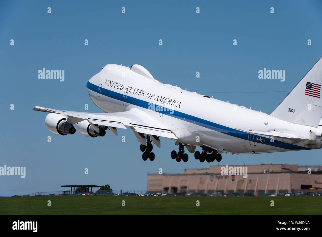 A U.S. Air Force E-4B National Airborne Operations Center aircraft takes off from Offutt Air Force Base, Nebraska, July 10, 2019.The main deck is divided into six functional areas: a command work area, a conference room, a briefing room, an operations team work area, a communications area and a rest area.(U.S. Air Force photo by Staff Sgt. Jacob Skovo) Stock Photo
