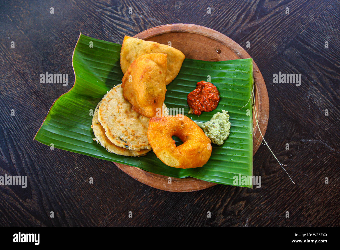 Traditional Sri Lanka dishes on banana leaf on the table Stock Photo