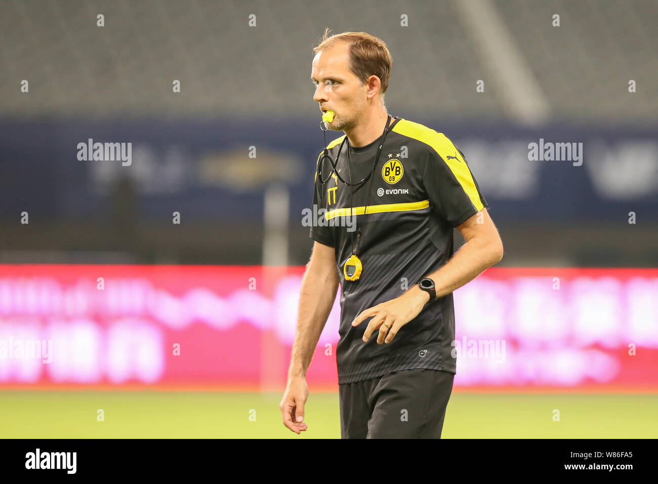 Head coach Thomas Tuchel of Borussia Dortmund looks at his players during a  training session for the Shanghai match of the 2016 International Champion  Stock Photo - Alamy