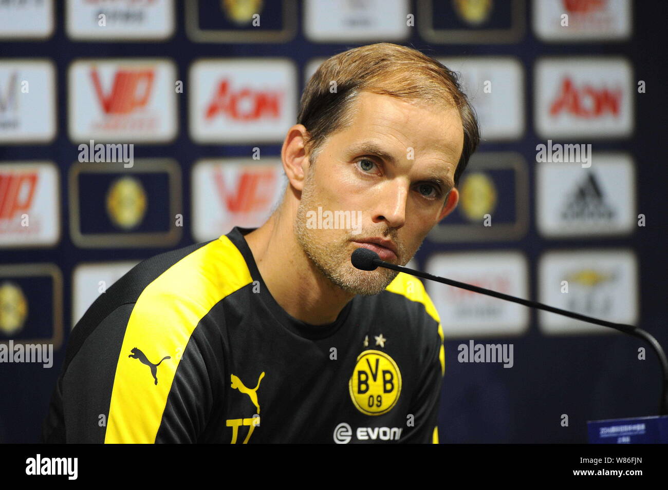 head-coach-thomas-tuchel-of-borussia-dortmund-listens-to-a-question-at
