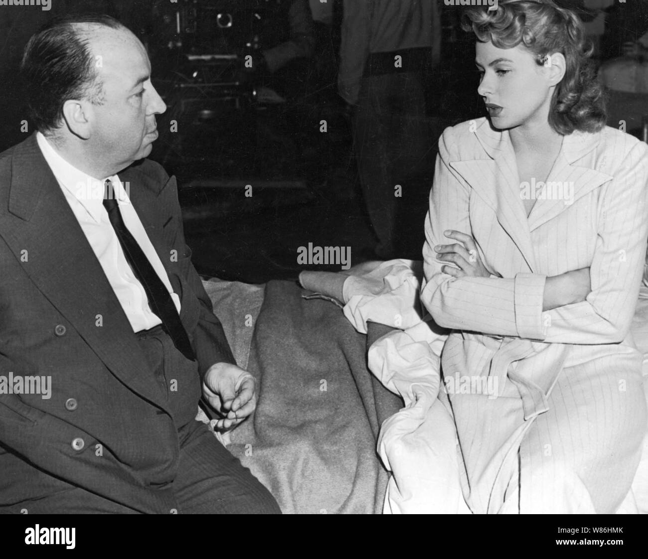 INGRID BERGMAN and ALFRED HITCHCOCK in SPELLBOUND (1945), directed by ALFRED HITCHCOCK. Credit: Selznick International Pictures/Vanguard Films / Album Stock Photo