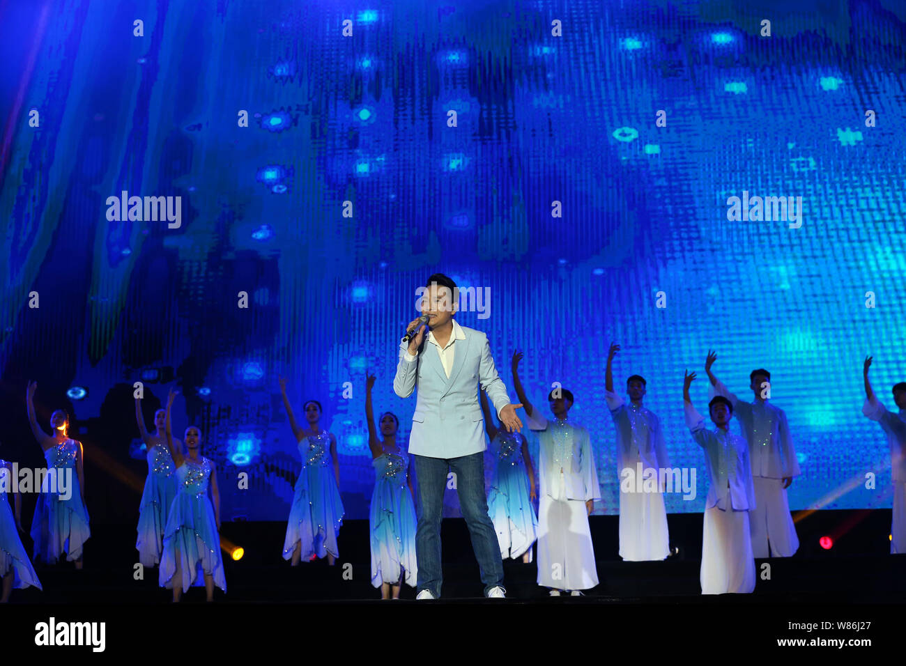 Taiwanese singer Jeff Chang Shin-Che performs at an all-star concert in Nantong city, east China's Jiangsu provine, China, 9 June, 2016. Stock Photo