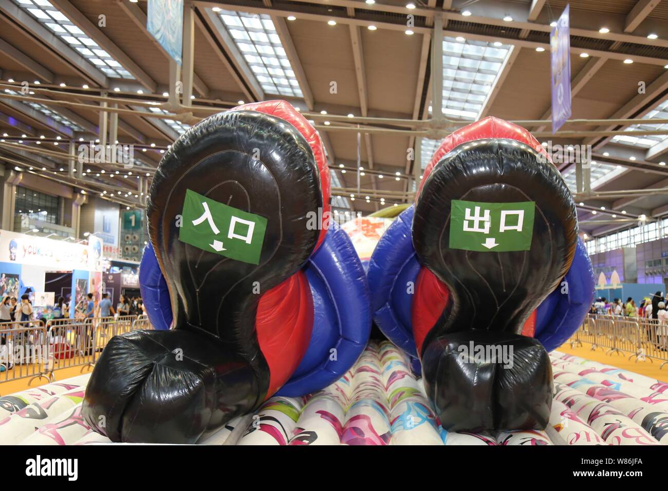 A giant inflatable doll is on display during the 2016 Shenzhen Cartoon and Animation Festival in Shenzhen city, south China's Guangdong province, 21 J Stock Photo