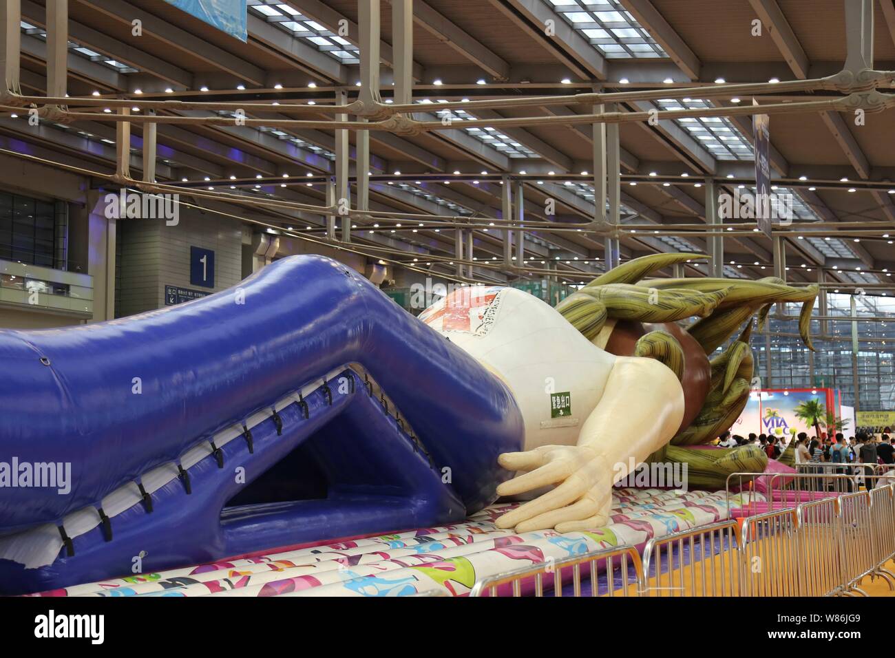 A giant inflatable doll is on display during the 2016 Shenzhen Cartoon and Animation Festival in Shenzhen city, south China's Guangdong province, 21 J Stock Photo