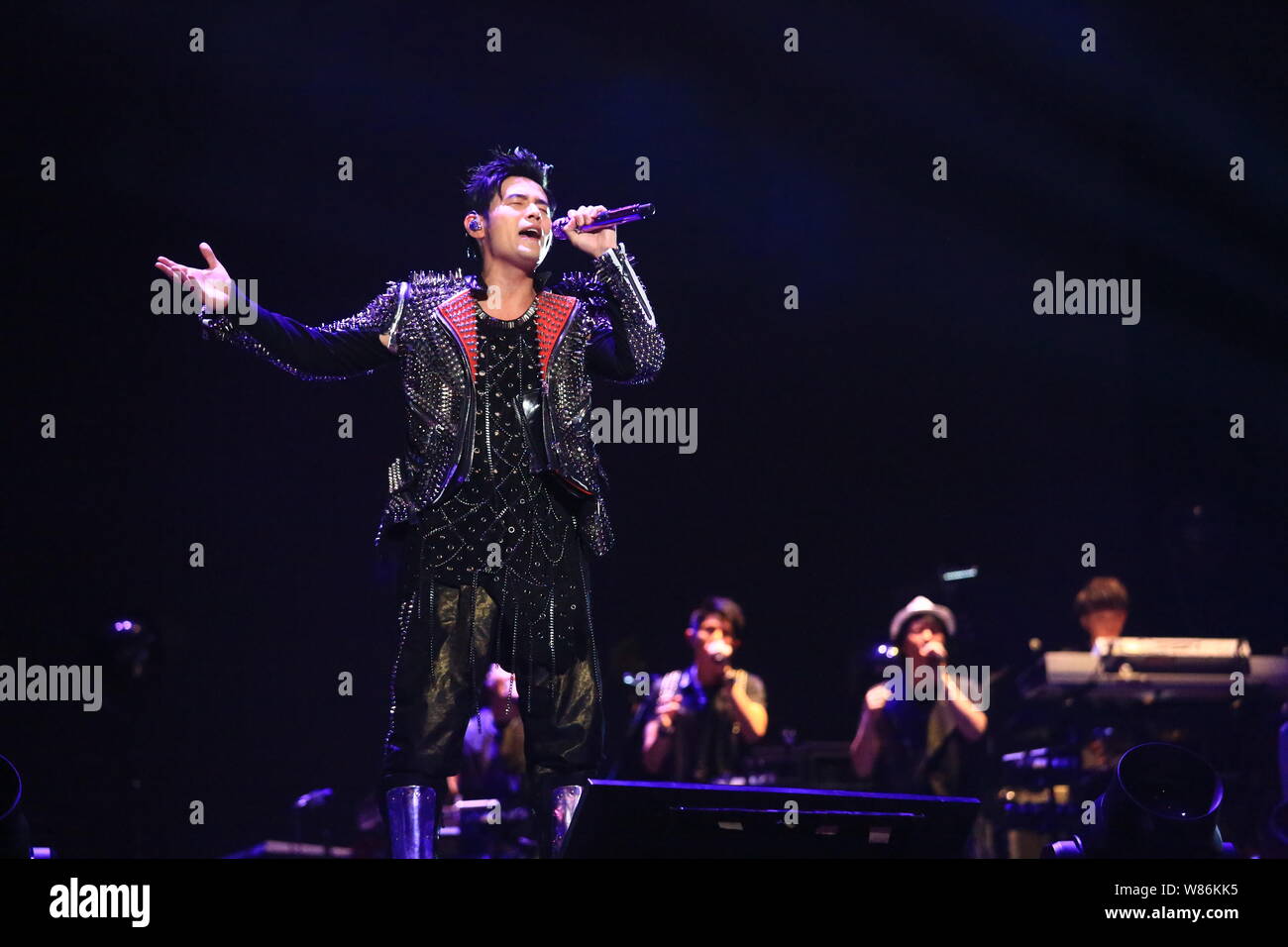 Taiwanese singer Jay Chou performs at the Shanghai concert during his "The Invincible" world tour in Shanghai, China, 30 June 2016. Stock Photo