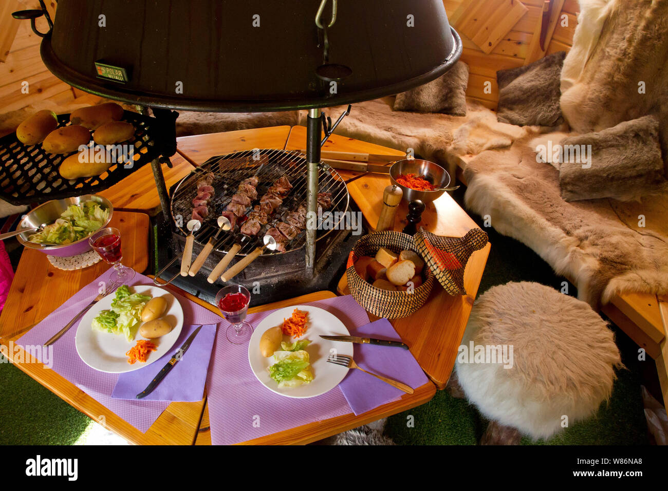 Grilled food and meal in a Finnish kota Stock Photo