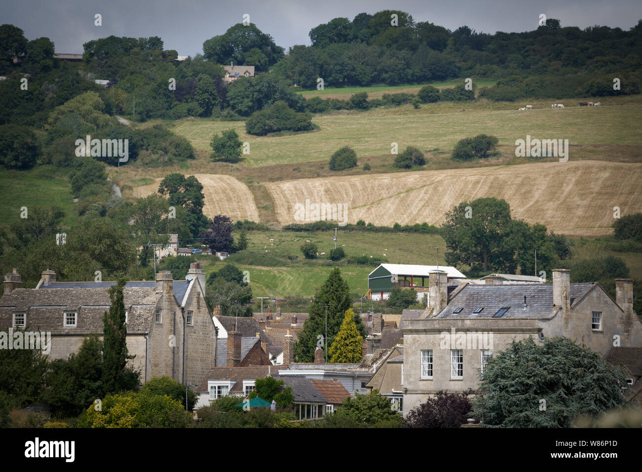 View of traditional Cotswold stone houses and fields. Winchcombe, the Cotswolds Stock Photo