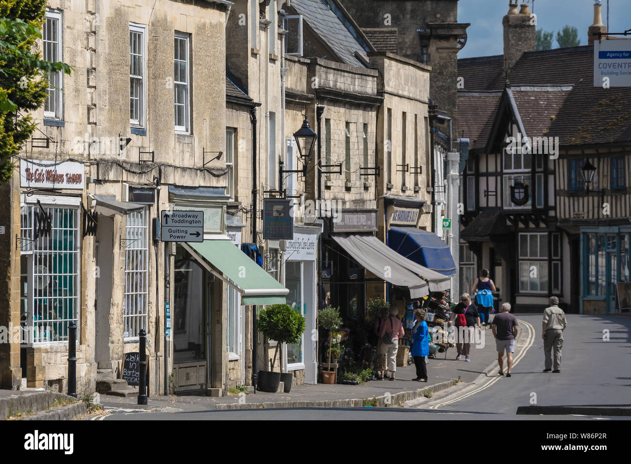 Shoppers / visitors, shops and local businesses. Street scene