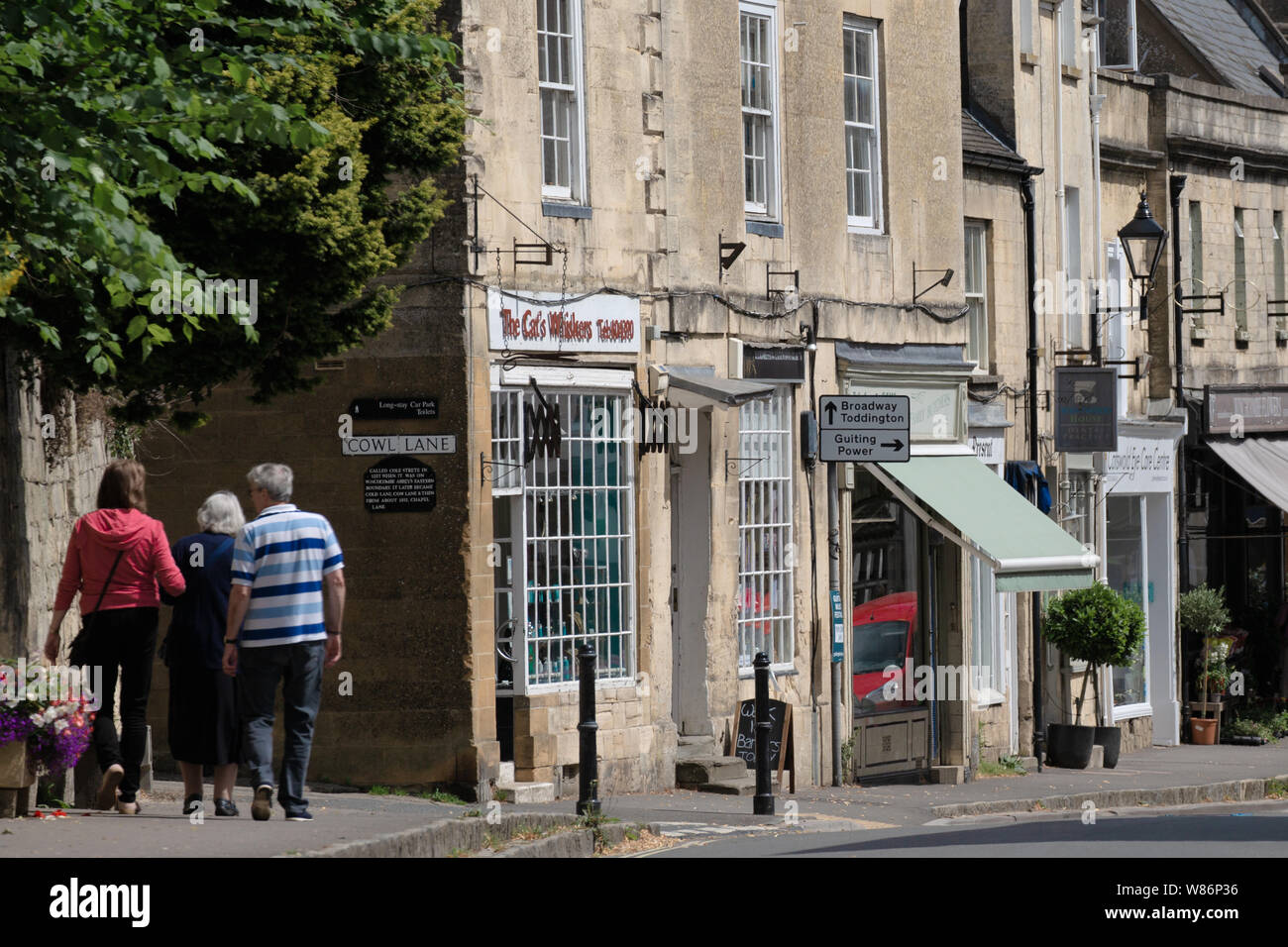 Shoppers / visitors, shops and local businesses. Street scene, Winchcombe, the Cotswolds, Gloucestershire Stock Photo