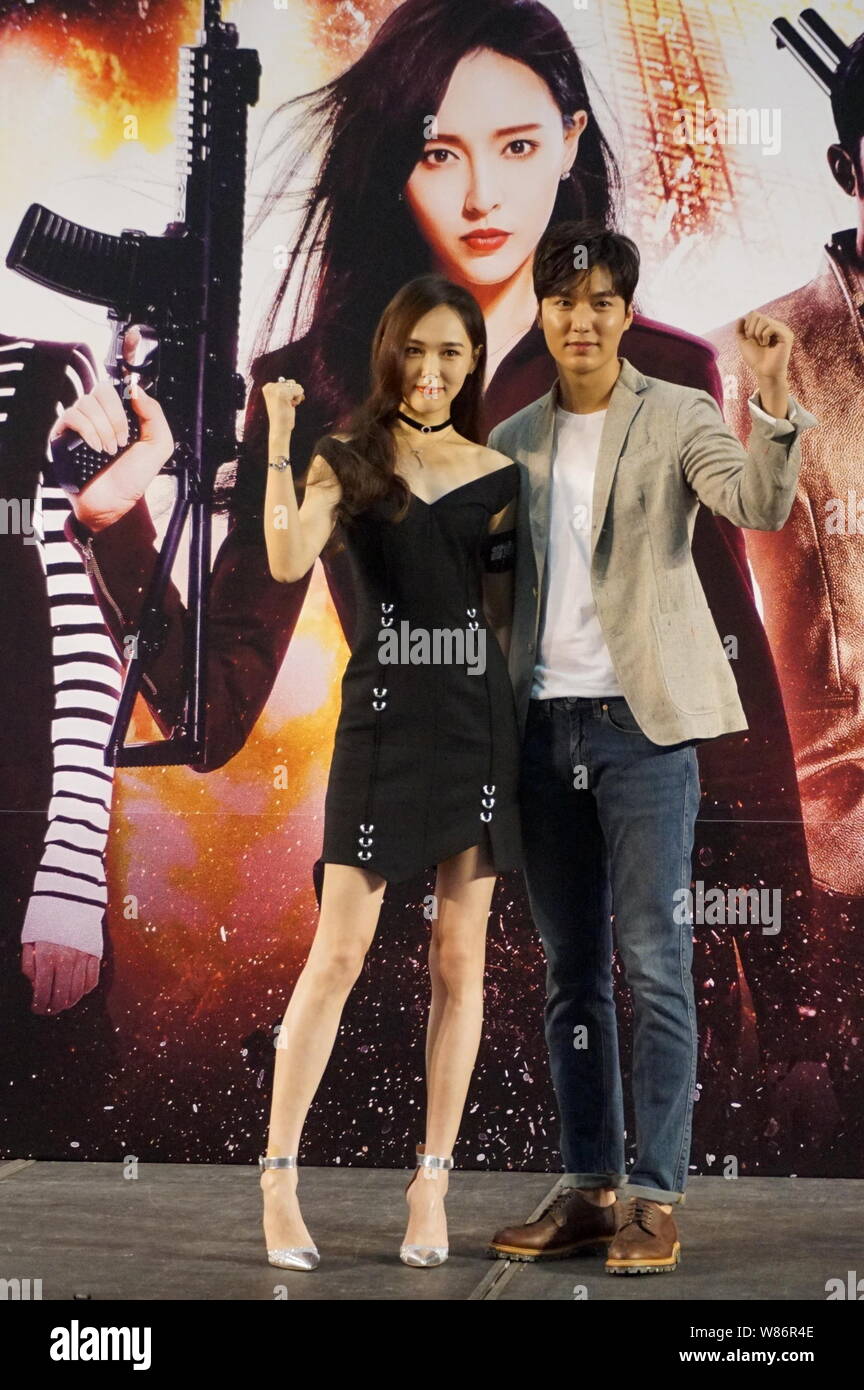 Chinese actress Tang Yan, left, and South Korean actor Lee Min-ho pose at a  promotional event for their movie 