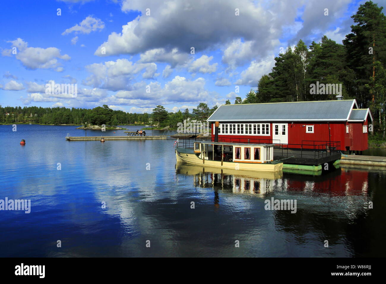 Forest lake in Norway, rorbu at Lofoten Stock Photo