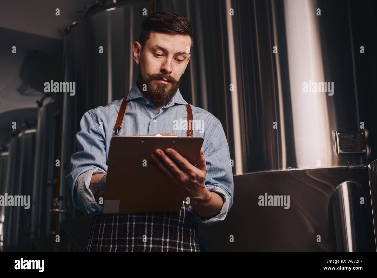 Bartender makes a check list of what else he needs to buy Stock Photo ...