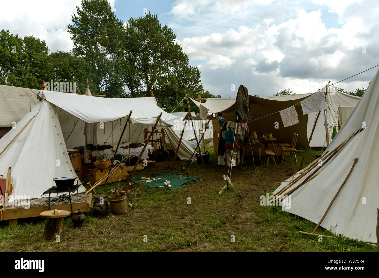 A tent use by a group of volunteers at Ribe Viking Centre at Lostrupholm, Denmark. Stock Photo