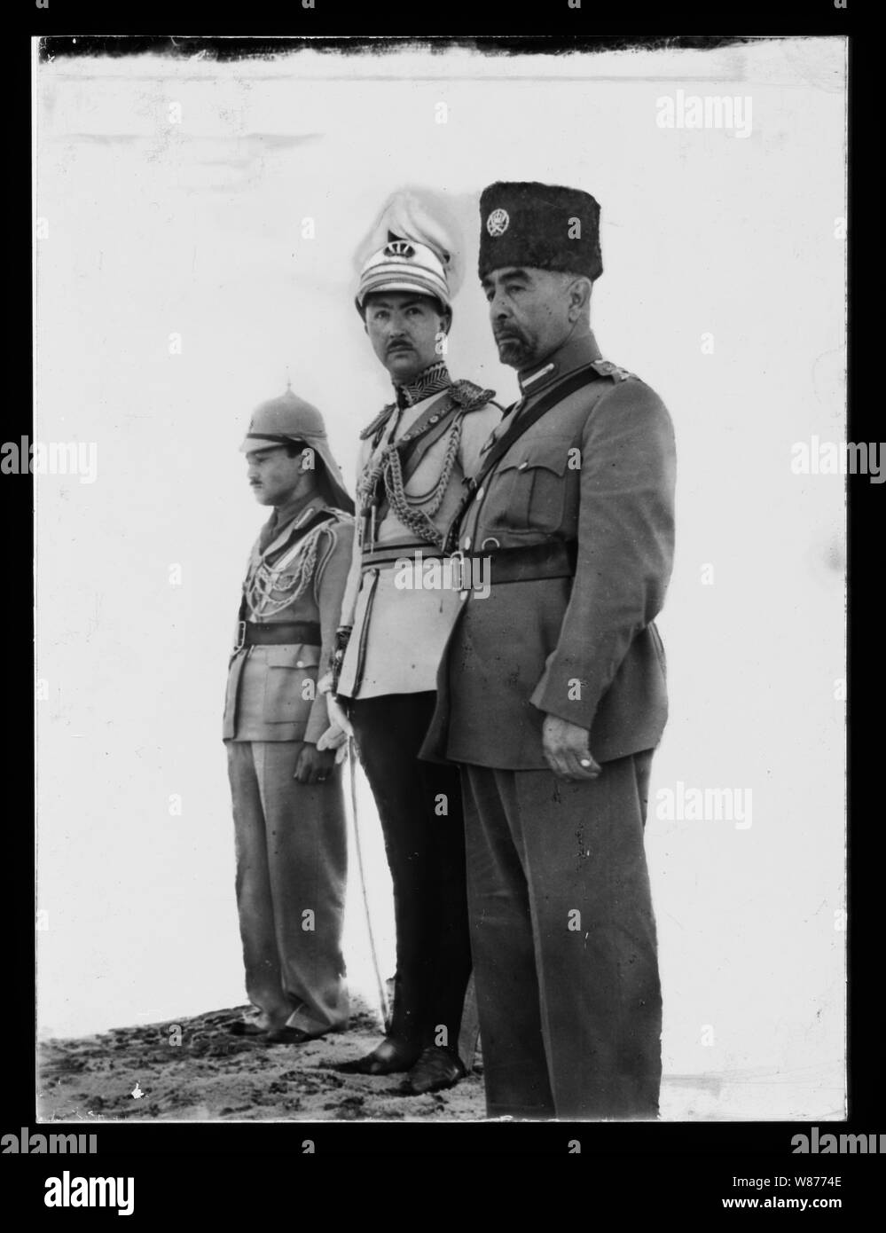 'Coronation' of King Abdullah in Amman. (right to left) King Abdullah, Emir Abdul Illah (Regent of Iraq), and Emir Naif (King Abdullah's youngest son) Stock Photo