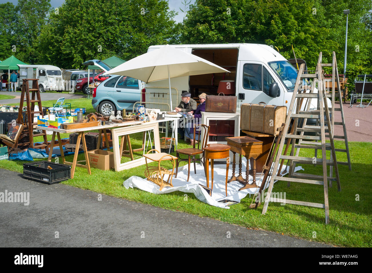 Furniture for sale at a traditional village fair or Foire a Tout in Normandy, France Stock Photo