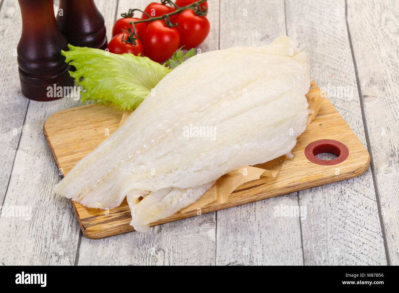 Raw halibut fillet ready for cooking Stock Photo Alamy