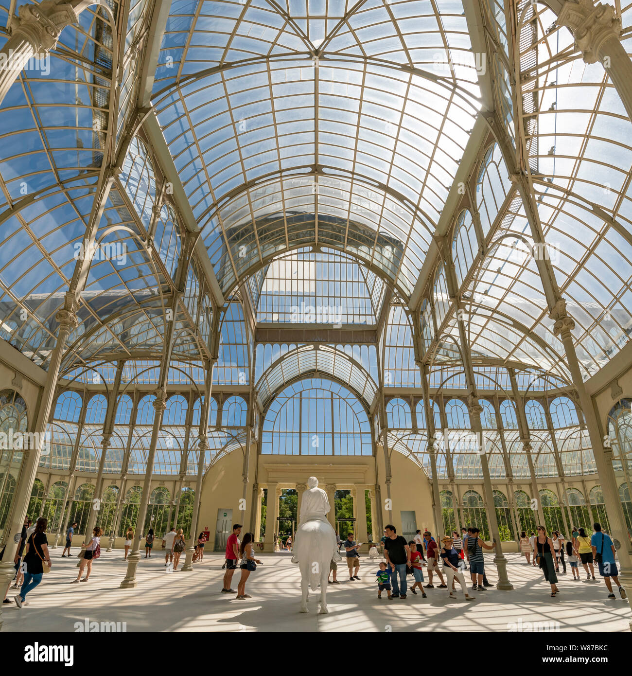 Square panoramic of the Palacio de Cristal at Retiro Park in Madrid. Stock Photo