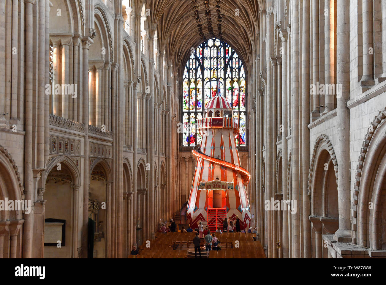 People view a 40ft helter skelter installed inside Norwich Cathedral as part of the Seeing It Differently project which aims to give people the chance to experience the Cathedral in an entirely new way and open up conversations about faith. Stock Photo