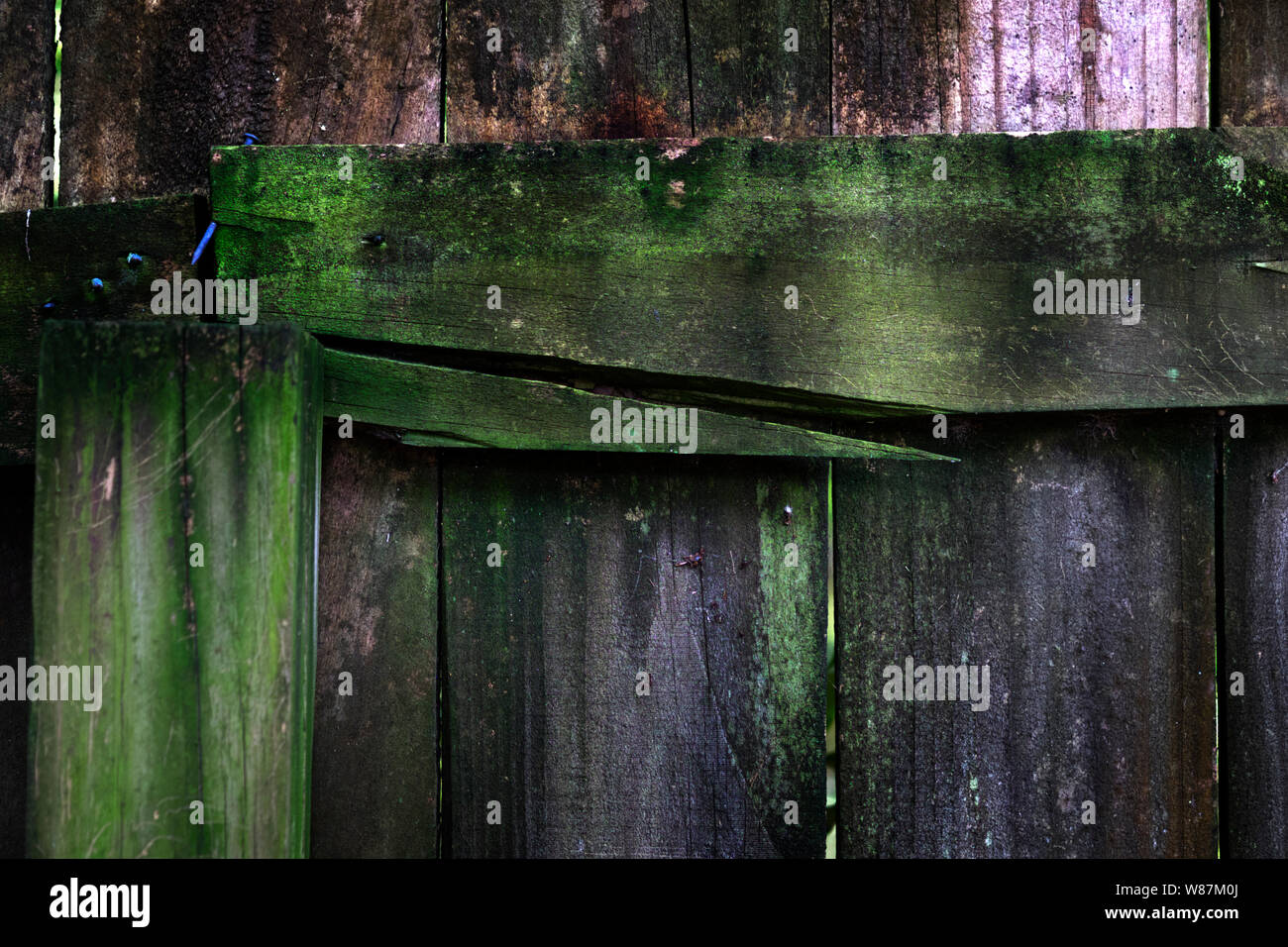 Decaying wooden fence in deep south Alabama, USA. Stock Photo