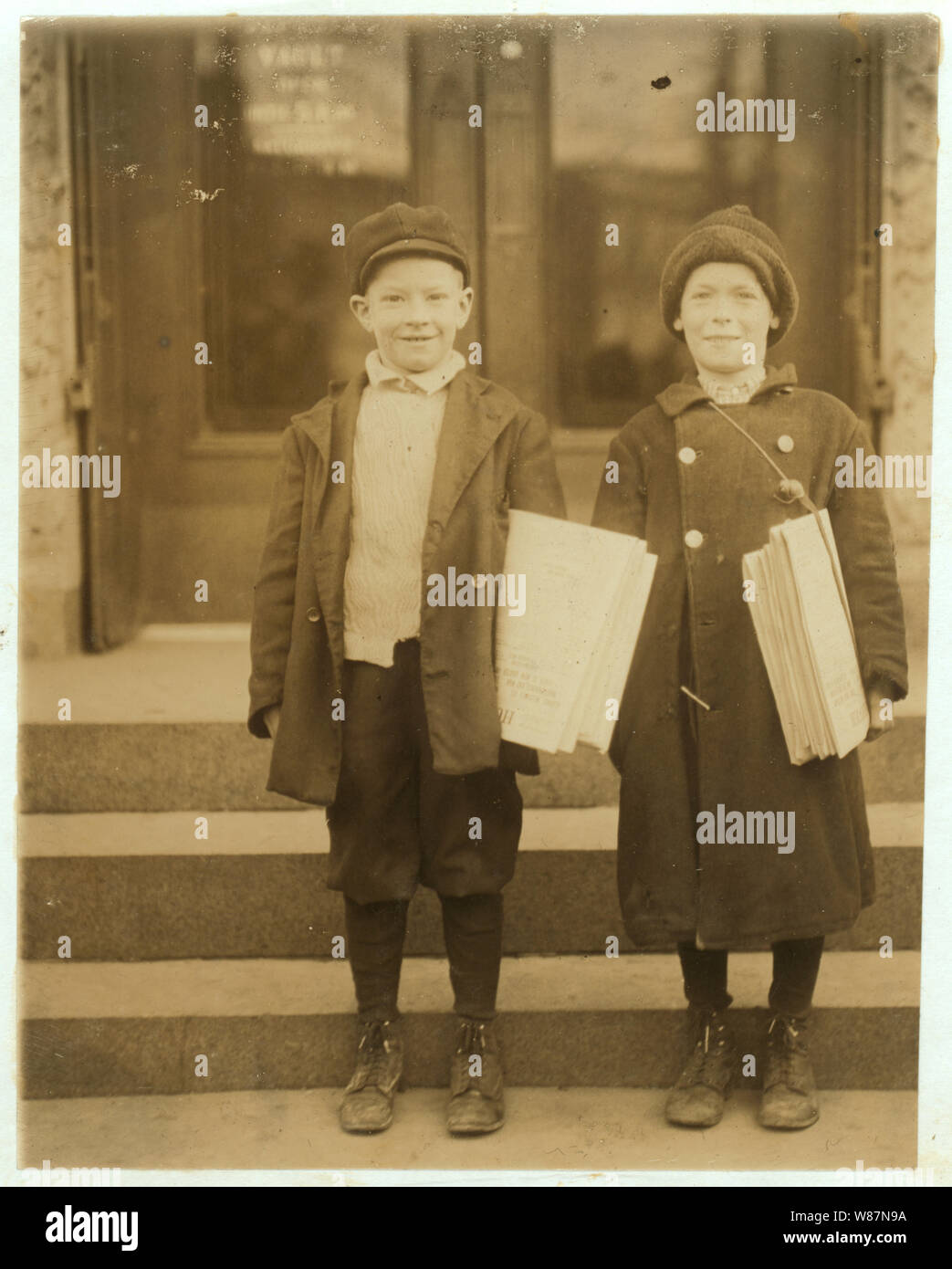 3 P.M. Teddy and Lester (on right) - both 9 yrs. old - and sell until 8 P.M. Stock Photo