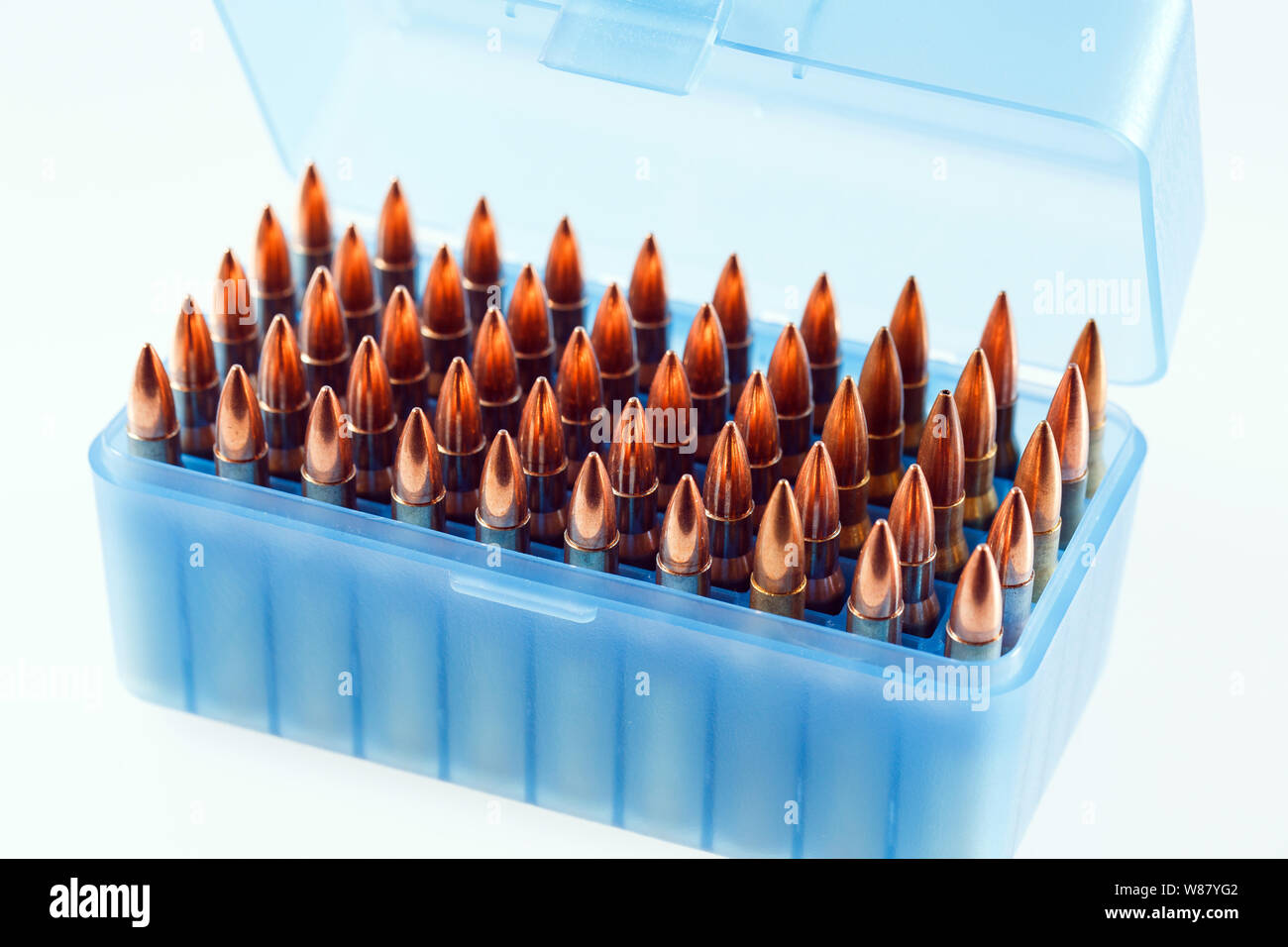 Hunting cartridges in a plastic box. Bullet storage box Stock Photo - Alamy