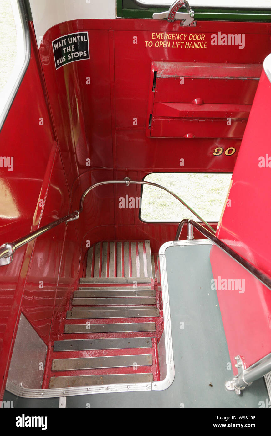 The stairs to the upper deck of an old 1955 open back Bristol KSW 6G double decker bus Stock Photo