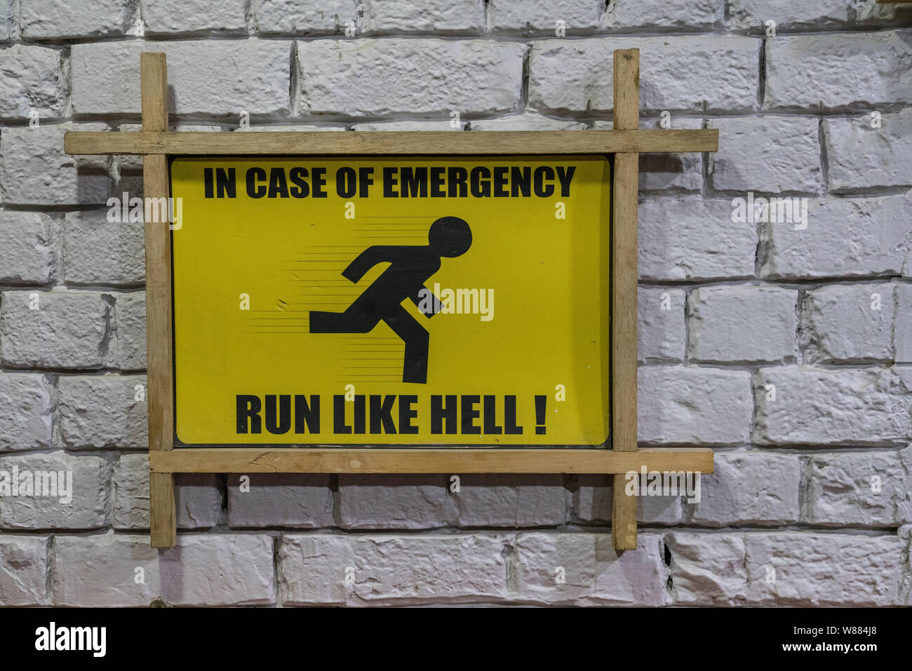 Running Like Hell New Dehli, India - February 19, 2018 - Sign says In case of emergency ...